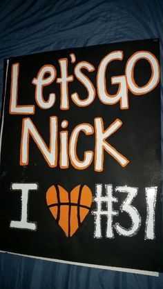 a sign that says let's go nick i love it