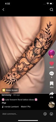 a woman's arm with flowers and butterflies on it