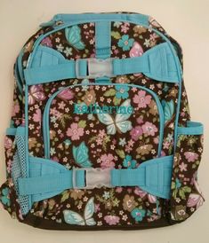 Super cute! Great for school, sports, or travel! This bag has already been personalized by PBK with the name "katherine." Looks nice! Size: Small 12" wide x 6" deep x 15" high. Fits children who are 43-49" tall. Can hold a lunch bag, two small notebooks, two books, and a water bottle. Condition: Brand new Color: Brown and multicolored butterfly floral pattern with blue accents Please note: Small name brand fabric tag down inside bag may be marked through in black to prevent returns to PBK. What Blue Backpack Gift For End Of School Year, Blue Rectangular Backpack As Gift, Affordable Purple Backpack For Play, Multicolor On-the-go Backpack For Back To School, Butterfly Backpack, Pottery Barn Kids Backpack, Purple Backpack With Zipper Closure For On-the-go, Inside Bag, Small Notebook