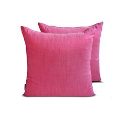 two pink pillows sitting next to each other