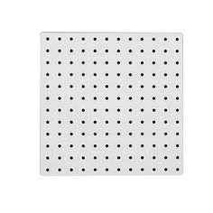 a white peg board with black dots on it