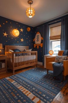 a baby's room decorated in blue and gold with stars on the wall, crib, rocking chair, and bed