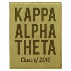 a brown leather book with the words kappa alphathea class of 2016 printed on it