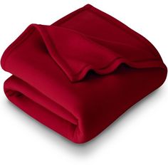 the red sheets are folded on top of each other