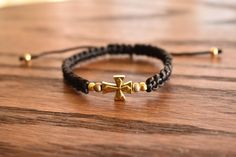 Handmade bracelet with cross, adjustable. Gold cross and gold beads, black satin cord. Adjustable Cross Jewelry With Cord, Adjustable Cross Jewelry With Adjustable Cord, Adjustable Cross-shaped Jewelry With Cord, Adjustable Gold Beaded Cross Bracelets, Adjustable Black Cross Bracelet, Bracelet With Cross, Satin Noir, Woven Bracelet, Gold Cross