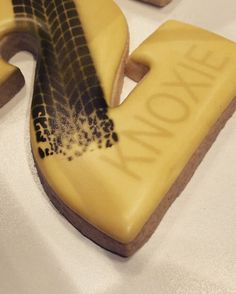 a cookie shaped like the letter x on top of a table