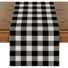 a black and white checkered table runner