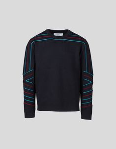 Named in honor of the ski legend and once Aspen resident Spider Sabich. This is not your average ski sweater! Knitted from water repellant Merino wool the Spider Sweater features an integral racing stripe motif with super fine 20g merino wool that ensures optimal warmth and breathability. Winter Sweater With Signature Stripes And Long Sleeves, Black Wool Sweatshirt With Ribbed Cuffs, Modern Black Wool Sweater, Sporty Winter Sweater With Contrast Stripes, Spider Sweater, Mountain Man Shirt, Ski Pants Women's, Mens Ski Pants, Womens Ski Pants