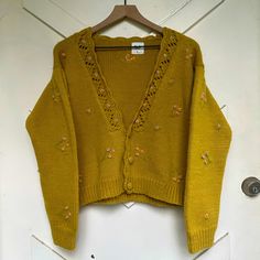 Sold Out Style From Tach Clothing. This Is Super Chunky And Warm, The Yarn Is Actually Super Soft. This Looks Great Over A Shirt Or Worn Alone As A Top. Made Of Ethically Sourced Merino Wool Yellow Fitted Casual Cardigan, Fitted Yellow Casual Cardigan, Mustard Fitted Sweater For Spring, Fitted Mustard Sweater For Spring, Yellow Fitted Vintage Cardigan, Fitted Vintage Yellow Cardigan, Yellow Fitted V-neck Cardigan, Super Chunky, Fall 2024