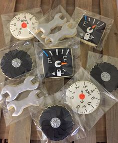 there are many decorated cookies in the shape of clocks