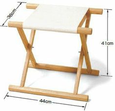 a small wooden stool with a white seat cover on the top and measurements for it