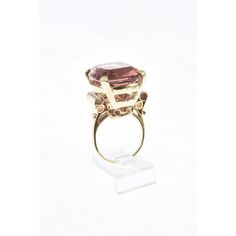 The Tourmaline is exquisite. The stone weights just over 32c.  It is a clean stone with a lovely rare color.  The 14k yellow gold mounting as scroll shoulders.  US size 7.25.  It can be sized. Tourmaline Fine Jewelry Ring For Formal Occasions, Oval Tourmaline Ring For Formal Occasions, Tourmaline Ring For Formal Occasions, Oval Tourmaline Jewelry For Formal Occasions, Oval Sapphire Tourmaline Ring For Formal Occasions, Formal Oval Tourmaline Jewelry, Classic Tourmaline Rings For Formal Occasions, Formal Ruby Ring With Gemstone Accents, Formal Oval Sapphire Ring With Tourmaline