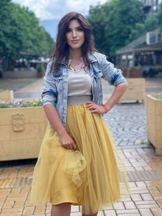 "This gorgeous skirt, made in ethereal gold tulle and combined with the elastic waistband, will make your silhouette even more elegant and romantic for a special evening! * Light, airy and wonderfully comfortable to wear * Due to the elastic waistband the skirt can be easily put on and taken off and fits perfectly * Handmade with love * Fast, safe and free shipping via FedEx /add your phone number in Notes at checkout, please/ Composition: 100% cotton lining, 2 gold tulle layers Care: Washing ma Gold Tulle Skirt, Yellow Tulle Skirt, Gold Tulle, Grey Bridesmaids, Gold Skirt, Evening Light, Orange Skirt, Yellow Skirt, Tulle Tutu