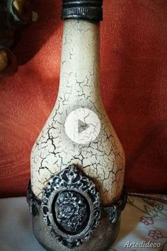 a bottle with an ornate design on it