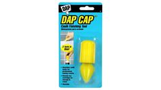 the dap cap is yellow and has a small plastic tip in it's packaging