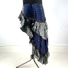 Luna Steampunk Over Skirt, Bustle skirt, tribal mini skirt, fashioned from vintage silk brocade.  This tail skirt is a great addition to all sorts of outfits.  Easily add an extra, colourful layer over leggings, tights, skirts or shorts. Wear at the back or side. The skirt is adjustable in fitting. It has 2 silk ties which are attached to two strong brass hoops for added style and functionality. Strong stitching, pleating and layers of ruched fabric on the tail makes this an eternally stunning p Tiered Skirt For Halloween Cosplay, Halloween Cosplay Tiered Skirt, Gothic Tiered Skirt For Cosplay, Gothic Tiered Skirt For Costume Party, Fitted Tiered Costume Skirt, Fitted Tiered Skirt For Costume, Fitted Tiered Skirt For Alternative Fashion, Steampunk Tiered Skirt For Cosplay, Gothic Fitted Mini Skirt With Ruffles