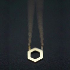 Charm: 1/4” Width - Solid gold or silver- Clean cut charm attached to cable chain- Charm is polished shiny finish Clean cut charm with sharp edges and smooth surface that characterizes Geometric forms. Delicate and versatile jewelry that gives an essence of elegance to wearers. Hexagon Necklace, Geometric Forms, Versatile Jewelry, Geometric Form, Clean Cut, Cable Chain, Silver Necklaces, Solid Gold, Arrow Necklace