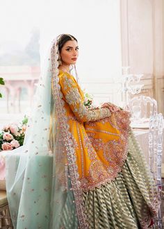 Yellow Blue Contrast Embroidered Pakistani Party Wear Sharara Kameez is a hand-crafted masterpiece to wear during the festivity. The beautiful details of tilla and Resham give a traditional touch to this stunning Sharara Suit. An embroidered dupatta gives a perfect finishing look to this masterpiece. Emboidered Kameez: Beautiful kameez in the alluring Yellow shade is a perfect choice to have your desired elegant look at the party. This kameez is gracefully adorned with beautiful work of crystals, pearls, and petals beads. Gota, kora dabka, and tilla enhance the glamour of this beautiful Pakistani Party Dress. Party Sharara: The embellished kameez is paired with a flared Sharara to have a stunning look at the magical event. The Sharara is adorned with embroidery and threads. The borders of Akbar Aslam, Vogue Clothing, Flared Sharara, Monsoon Wedding, Pakistani Boutique, Fuchsia Wedding, Pakistani Designer Clothes, Clothing Studio, Pakistani Party Wear