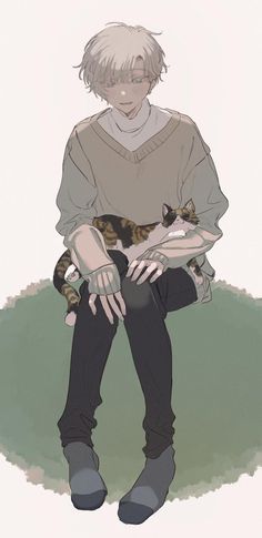 a person sitting on the ground with a cat in his lap and one arm around him