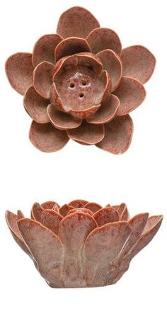 an image of two clay pots with flowers in them on white background for use as wall decor