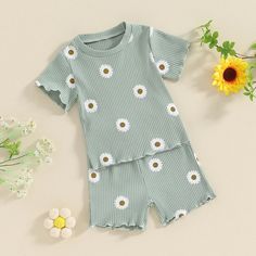 This JULIE Ribbed Summer Outfit is perfect for your little fashionista! The short sleeve shirt and matching shorts will keep her cool and stylish this summer. Perfect for any sunny day out. (Baby girls, we've got you covered!) Trendy Cotton Short Sleeve Sets, Cotton Short Set For Playtime In Spring, Cotton Short Set For Spring Playtime, Playful Short Tops For Spring, Playful Short Sleeve Sets For Spring, Playful Short Sleeve Spring Sets, Summer Sets With Short Sleeves, Trendy Green Short Sleeve Sets, Spring Playwear Short Set