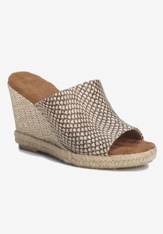 A high-heeled wedge sandal that feels like you are walking on clouds! Kinsley by Ros is made from soft leather uppers with a silky knit-fit lining that includes discreet instep goring for foot flexibility. The raffia covered 3 1/2” wedge heel is offset with a 1/2” platform and accentuated with braided roping along the edge. A super cushioned, pillowy footbed and moderate arch support provide comfort with every step! Dressed up or worn casually, you’ll find yourself wearing Kinsley all summer long!Leather UpperPolyurethane Outsole3 1/2" Heel heightSandal available in sizes Narrow/2A (6-11,12,13) Medium/B (6-11,12,13) - Wide/D (6-11,12,13), W Wide/2E (6-11,12,13) On Clouds, Walking On Clouds, Swimsuits For All, Wedge Sandal, Printed Leather, Walk On, Snake Print, Arch Support, Wedge Heels