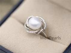 "This pearl ring is made of 9mm AAA genuine freshwater round pearls, setting with sterling silver and crystal mount, size is adjustable, it is a open ring. Gift for wedding, birthday, friend,anniversary gifts. ~Jewelry: Genuine Pearl Ring,S925 Sterling Silver Ring ~Natural Freshwater pearls ~Pearl Luster: High,good ~Pearl skin: clean ~Pearl Shape: Button Round ~Pearl Color: white ~Pearl Size: 10mm ~Pearl quality: AAA ~Metal: sterling silver with rhinestone,NICKLE FREE, ~Ring size: suitable finge Pearl Ring Designs Unique, Pearl Wedding Rings, Pearl Ring Design, Pearl Ring Simple, Leather Pearl Jewelry, Affordable Engagement Rings, Pearl Wedding Ring, Rings Pearl, Jewellery Luxury