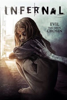 the poster for the upcoming horror film, infernal with a woman holding her arm out