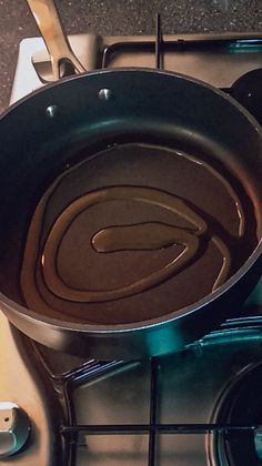 a pan is sitting on top of the stove