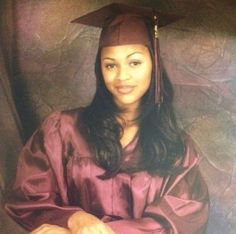 a woman wearing a graduation cap and gown