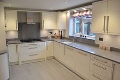 the kitchen is clean and ready for us to use in its new owner's home