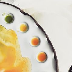 a plate with eggs and sauce on it