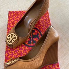 Tory Burch Wedge Heels. Size 8, Grainy Leather, Tan Color, Rubber Sole. Good Condition. Worn A Couple Of Times. Has Very Minor Scuff At The Top Of The Shoe. Heel Is Slightly Worn Out. Tory Burch Wedges, Womens Shoes Wedges, Tory Burch Shoes, Tan Color, Wedge Heels, Tory Burch, Rubber Sole, Wedges, Women Shoes