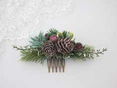 "A beautiful flower comb from our new collection \"Forest\". You'll fall in love with stunning tones of green and brown. Thanks to the use of natural pine cones and artificial leaves, the hair comb is durable. Our lovely floral comb will be a keepsake for many years to come. It is a special touch to your bohemian look! Dimensions are given in centimeters 1 in = 2.54 cm Thank you for visiting our store!" Enchanted Forest Wedding Theme, Christmas Headpiece, Winter Wedding Hair, Forest Theme Wedding, Wedding Comb, Woodland Flowers, Artificial Leaves, Enchanted Forest Wedding, Floral Comb