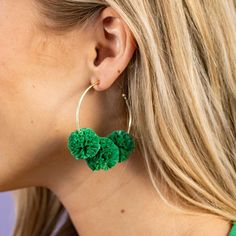 Celebrate the lively spirit of the Rio collection with our Rita Raffia Poms Hoop Earrings in Kelly Green. The vibrant green color and playful raffia poms capture the essence of the lush landscapes. Rita is a delightful accessory for those who want to infuse their look with a sense of natural vibrancy. --DETAILS-- 2.25" L, .70" W Handmade by skilled artisans in India Hypoallergenic nickel + lead-free brass hardware These accessories are made by human hands. A slight variation in size and color is Human Hands, Earring Trends, Hoop Earring Sets, Human Hand, Crystal Stud Earrings, Vibrant Green, Accessories Jewelry Earrings, Kelly Green, Accessories Branding