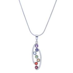 Seven spectacular faceted gemstones in a rainbow of colors are grasped firmly by brilliant high-polish sterling silver arches in this pendant necklace by Thailand's Abhishek Singla. Singla uses amethyst garnet blue topaz peridot citrine carnelian and iolite to represent the seven chakras. The pendant hangs from a sterling silver snake chain. The Seven Chakras, Seven Chakras, Silver Snake Chain, Gemstone Necklace Pendant, Faceted Gemstones, The Seven, Snake Chain, Gemstone Pendant, Blue Topaz