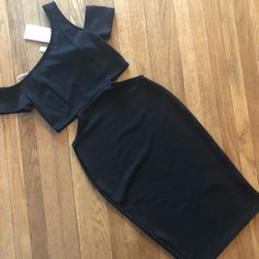 Off Shoulder, Cut Outs , Bodycon Style Stretchy, Pull On 96% Polyester 4% Spandex Pit To Pit: 14” Flat Waist: 13” Flat ( Approximately ) Hips: 16” Flat Length: 39” Black Sleeveless Bodycon Dress With Cutout, Night Out Elastane Bodycon Dress With Cutout, Black Elastane Bodycon Dress For Date Night, Stretch Bodycon Dress With Cutout For Date Night, Black Cutout Midi Dress For Summer, Black Cutout Bodycon Mini Dress, Black Bodycon Mini Dress With Cutout, Black Elastane Midi Dress For Spring, Fitted Black Dress With Cutout Details