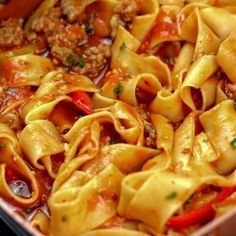 a casserole dish with meat and vegetables in it