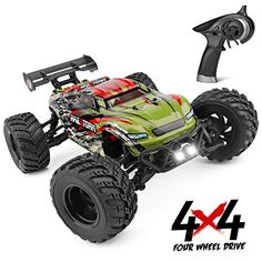 the remote controlled monster truck is green and red