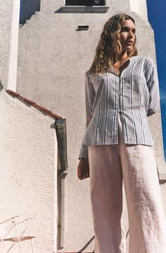 An elegant and effortless piece to pair with the Solimar shirt or the Isla shirt. Crafted in Argentina from 100% linen with a relaxed fit, elasticated waistline, flare leg and side split.Available in Habano, Dulce and White.Federica wears a XS-S Size guide Linen Summer Pants For Daywear, Summer Linen Pants For Daywear, Summer Essential, Side Split, Summer Essentials, Blue Stripes, Bermuda Shorts, Bell Sleeve Top, Split