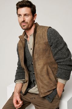 With its rugged, minimalist design and durable, high-quality suede that's soft to the touch, the William vest is a versatile outer layer for fall through spring. Made from hardy goatskin suede leather with a vintage finish, this zip-front vest with stand-up collar features two outer zip pockets, plus inner zip and slip pockets to store gloves and other essentials. Fully lined with soft, smooth fabric. Mens Vest Outfits, Men's Vest Fashion, Mens Sport Coat Outfit, Sport Coat Outfit, Man Vest, Men's Leather Jackets, Mens Vest Fashion, Vest Men, Suede Vest