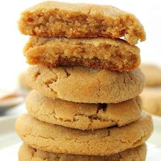 a stack of cookies sitting on top of a white plate