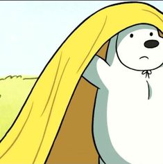 a polar bear with long blonde hair standing in the grass