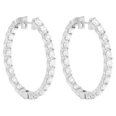 18K White Gold Diamond Earrings featuring 8.12 Carat T.W. of Natural Diamonds Underline your look with this sharp 18K White Gold Diamond Earrings. High quality Diamonds. This Earrings will underline your exquisite look for any occasion. . is a leading supplier of top-quality fine jewelry for over 35 years. is one-stop shop for all your jewelry shopping, carrying line of diamond rings, earrings, bracelets, necklaces, and other fine jewelry. We create our jewelry from gemstones and diamonds of the highest quality (GIA certified) as well as the highest quality of gold and platinum to deliver magnificent, exquisite items that will bring a lot of happiness to its owner. All purchases come with a jewelry box. . 18K White Gold Diamond Earrings featuring 8.12 Carat T.W. of Natural Diamonds • Craft White Gold Diamond Earrings, Round Diamond Setting, Gold Diamond Earrings, Diamond Hoop Earrings, Quality Diamonds, Jewelry Earrings Hoops, Diamond Gemstone, White Gold Diamonds, Jewelry Earrings Studs