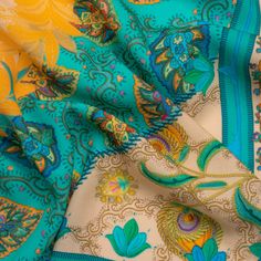 a blue and yellow paisley print fabric