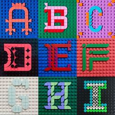 the letters are made out of legos and have different colors, shapes, and sizes