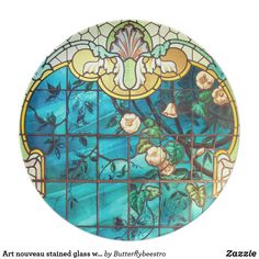 a stained glass plate with flowers on it