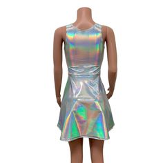 A-line holographic mini rave dress 25" length from armpit to bottom hem (free custom length using the personalization box) 2 side pockets Higher neckline Opal iridescent holographic spandex Handmade in the USA Dress Festival Outfit, Holographic Dress, Rave Dress, Harley Quinn Costume, Custom Shorts, Daisy Print, Rave Outfits, Festival Outfit, High Neckline