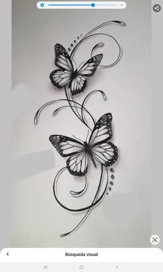 a drawing of two butterflies with swirls on it