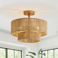 Make a style statement with the coastal-inspired 3-Light 2-Tier Semi-Flush Mount Light. Its drum shade is strung with rows of natural jute rope, allowing light to shine through and providing a stylish look even when the lights are off. Finished in antique gold. With its durable material and Bohemian style, it adds a touch of elegance to any space. 2 tiers of jute ropes create a refined and organic vibe, great for farmhouse, nautical or rustic style decor Fixture dimensions: diameter 15.4 in. x h Boho Light Fixture, Bamboo Ceiling, Gold Ceiling Light, Nursery Lighting, Bedroom Light Fixtures, Flush Mount Chandelier, Semi Flush Mount Lighting, Jute Rope, Mount Light